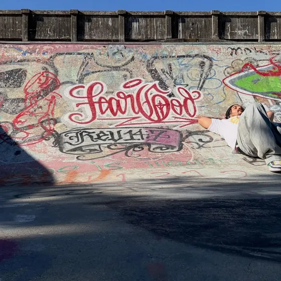 Skatepark wall with Fear God graffiti